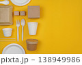 Sustainable tableware set on yellow background 138949986