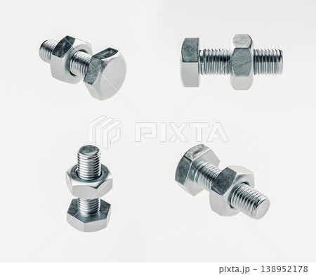 Assorted Metallic Bolts and Nuts on White Background 138952178