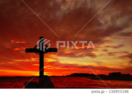 Cross With Crown of Thorns Blood Red Sunset Sky Cross With Crown of Thorns Blood Red Sunset Sky 138953196