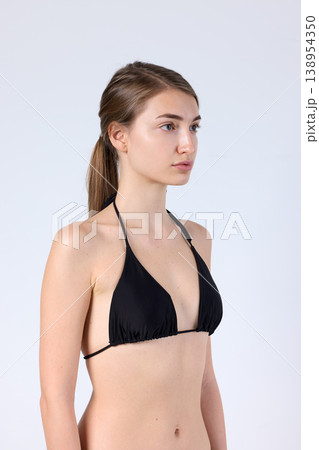 Studio Side Profile Model in Black Halter Bikini 138954350