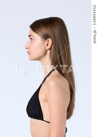 Studio Side Profile Model Looking Forward in Bikini 138954352