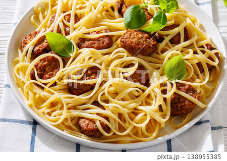 Pasta linguine with meatballs, pesto sauce, lemon Pasta linguine with meatballs, pesto sauce, lemon 138955385