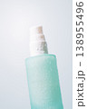 Close up of frosted cosmetic pump bottle in soft natural light 138955496