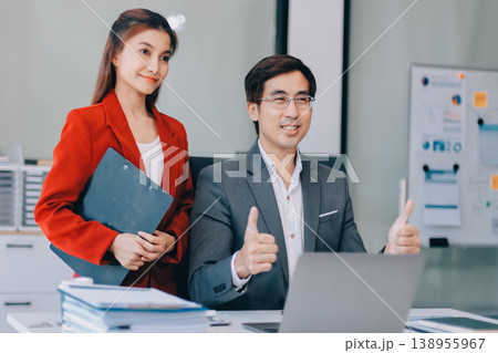 Group of business people and software developers working as a team in office 138955967