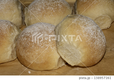 Delicious fresh baked bread rolls close up home made baked goods Delicious fresh baked bread rolls close up home made baked goods 138957161