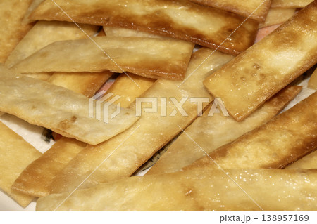 Home made fried tortilla bread slices to dip into soup Home made fried tortilla bread slices to dip into soup 138957169