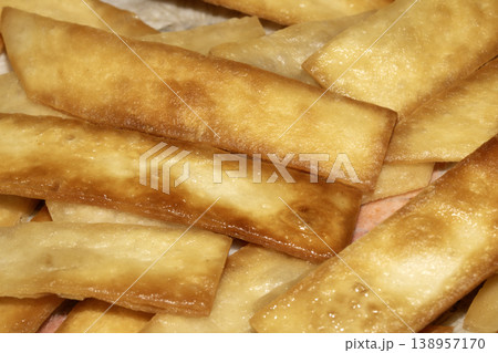 Home made fried tortilla bread slices to dip into soup Home made fried tortilla bread slices to dip into soup 138957170