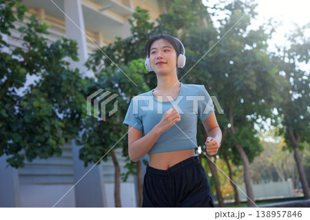 woman running in the park 138957846