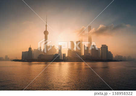 Foggy sunrise over Shanghai skyline with Oriental Pearl Tower and financial skyscraper in Pudong district Foggy sunrise over Shanghai skyline with Oriental Pearl Tower and financial skyscraper in Pudong district 138958322