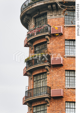 Historic Wukang Mansion brick facade and flower balcony in Shanghai Historic Wukang Mansion brick facade and flower balcony in Shanghai 138958358
