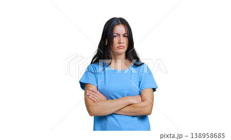 Frustrated young woman crossing arms looking annoyed 138958685