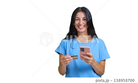 Woman smiling holding credit card and smartphone online shopping Woman smiling holding credit card and smartphone online shopping 138958700