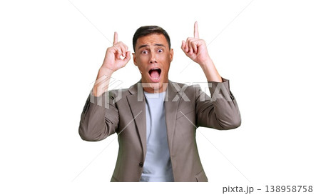 Businessman pointing up expressing enthusiasm and excitement Businessman pointing up expressing enthusiasm and excitement 138958758