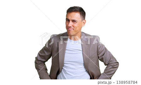 Confident man smirking and looking at camera Confident man smirking and looking at camera 138958784
