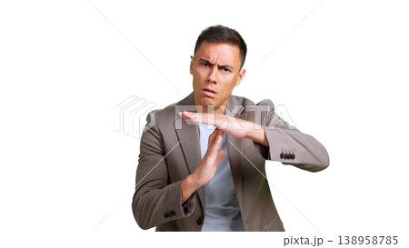 Businessman showing timeout gesture calling for a break Businessman showing timeout gesture calling for a break 138958785