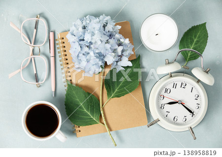 Morning Routine Flat Lay with Notebook, Coffee, and Hydrangea Morning Routine Flat Lay with Notebook, Coffee, and Hydrangea 138958819