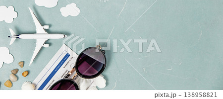 Travel Concept Flat Lay with Airplane, Sunglasses, and Boarding Pass 138958821