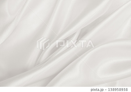 Smooth elegant golden silk or satin luxury cloth texture as wedding background. Luxurious background design. In Sepia toned. Retro style Smooth elegant golden silk or satin luxury cloth texture as wedding background. Luxurious background design. In Sepia toned. Retro style 138958938