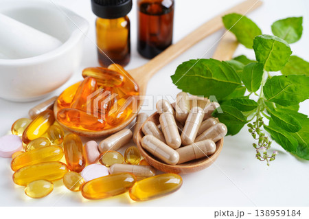 Alternative medicine herbal organic capsule with vitamin E omega 3 fish oil, mineral, drug with herbs leaf natural supplements for healthy good life. 138959184