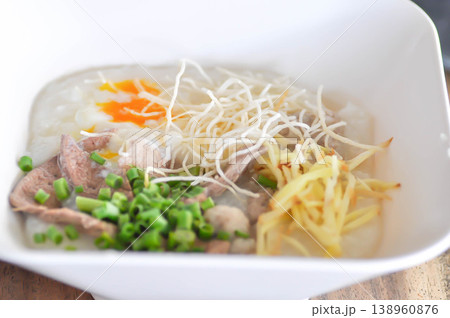 rice gruel or rice porridge or congee with pork ball, pork liver and egg or pork congee 138960876