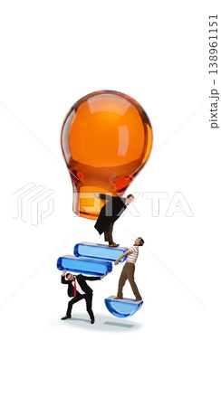 Business people building light bulb together symbolizing idea creation and teamwork 138961151