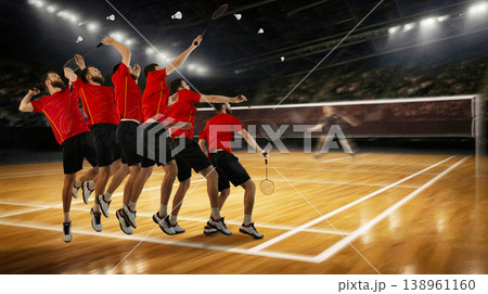 Badminton player smash motion sequence on indoor court with shuttlecock trajectory. 138961160
