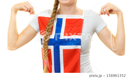 Young woman holding norwegian flag Young woman holding norwegian flag 138961352