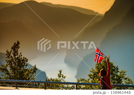 Tourist enjoy fjord view on Stegastein viewpoint Norway 138961448