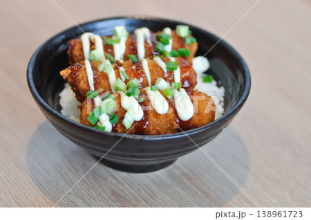 fried pork and rice, pork ball or fried sausage and rice or Breaded Pork Cutlet Bowl or Butadon or Deep fried Pork Cutlet on Rice or Japanese pork cutlet rice bowlJapanese pork rice bowl 138961723