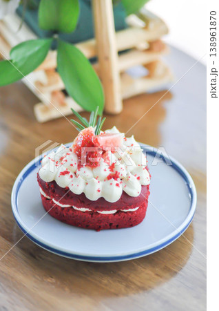 red velvet cake with strawberry topping or a piece of cake or small cake 138961870