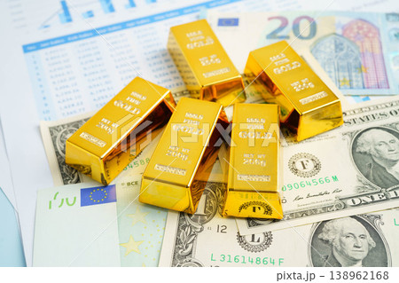 Gold bars with US dollar and Euro banknote money, finance trading investment business currency concept. Gold bars with US dollar and Euro banknote money, finance trading investment business currency concept. 138962168