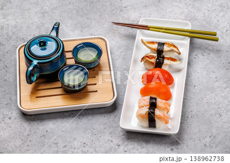 Sushi set with tea and small teapot Sushi set with tea and small teapot 138962738