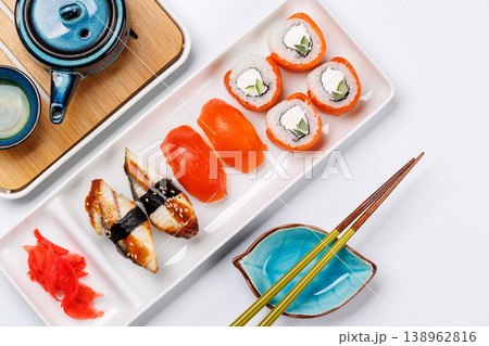 Sushi set with tea and small teapot Sushi set with tea and small teapot 138962816