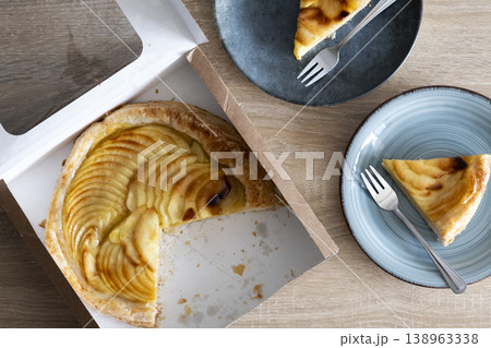 Apple pie slices served on ceramic plates Apple pie slices served on ceramic plates 138963338