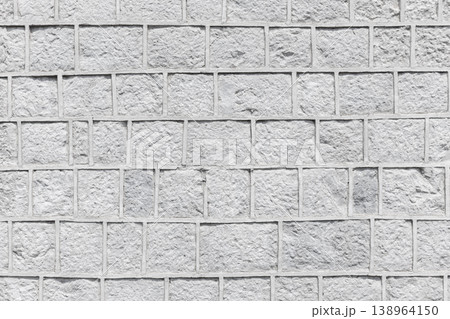 White stone wall with rough textured bric surface, texture White stone wall with rough textured bric surface, texture 138964150