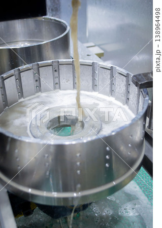 Wire-cut electrical discharge machine. Operation of wire-EDM machine cutting metal parts. Electrical discharge machine EDM cutting metal workpiece. Cutting process by wire cut machine. Metalworking Wire-cut electrical discharge machine. Operation of wire-EDM machine cutting metal parts. Electrical discharge machine EDM cutting metal workpiece. Cutting process by wire cut machine. Metalworking 138964498