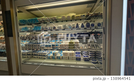 Various Greek feta cheese displayed in the open refrigerator Various Greek feta cheese displayed in the open refrigerator 138964541