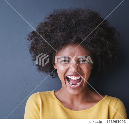 Laughing, black woman and portrait in studio with happiness, comedy or freedom in mockup space. Happy, face and African lady smile, emoji or crazy reaction to joke or humor on grey background 138965008