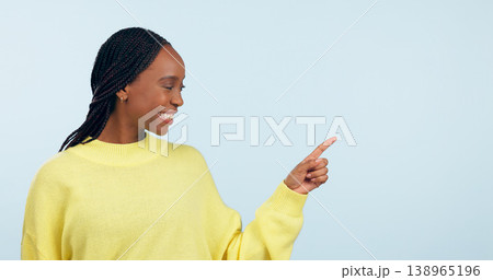 Pointing, smile and black woman with opportunity, decision and announcement on a blue studio background. African person, model and girl with hand gesture, mockup space and choice with news or sale Pointing, smile and black woman with opportunity, decision and announcement on a blue studio background. African person, model and girl with hand gesture, mockup space and choice with news or sale 138965196