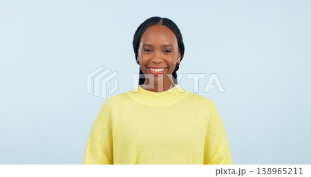 Portrait, young black woman and smile in studio with confidence, good mood or casual fashion isolated on blue background. Happy gen z model with cheerful personality, pride or mockup space in Nigeria Portrait, young black woman and smile in studio with confidence, good mood or casual fashion isolated on blue background. Happy gen z model with cheerful personality, pride or mockup space in Nigeria 138965211