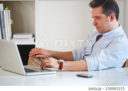 Businessman, office or laptop for information technology research, tech support or working. Typing, online or computer with software update, email or corporate worker at desk for digital app review Businessman, office or laptop for information technology research, tech support or working. Typing, online or computer with software update, email or corporate worker at desk for digital app review 138965215