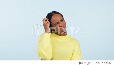 Confused woman, scratch head and thinking in studio of questions, solution and dont know why on blue background. Curious african model with doubt of decision, forgot memory and problem solving ideas 138965300