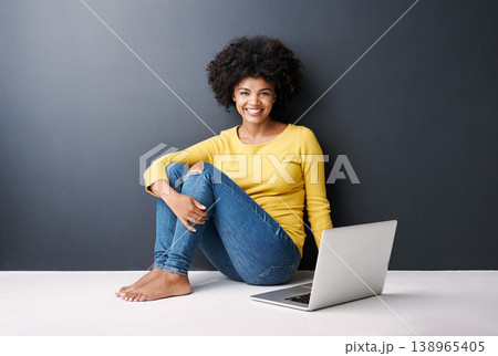Online class, work and portrait of black woman with laptop, mockup and happiness on floor in studio background. Computer, research or college student typing on keyboard for work, project or elearning 138965405