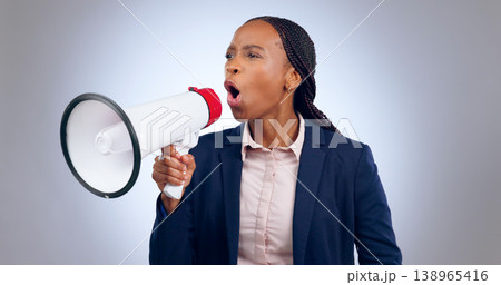 Megaphone, speech and angry business woman in studio for change, transformation or freedom on grey background. Corporate, justice and female speaker with bullhorn noise for announcement attention 138965416