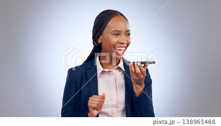 Business woman, phone call and voice with speaker in studio for translation app, sound and contact on grey background. Happy african worker, communication and talk on mobile microphone for audio chat Business woman, phone call and voice with speaker in studio for translation app, sound and contact on grey background. Happy african worker, communication and talk on mobile microphone for audio chat 138965468