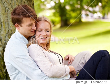 Nature, relax and happy couple hug, love and cuddle in outdoor park, green garden or grass field, pitch or lawn. Summer freedom, support and romantic man, woman or marriage people hugging on ground 138965566