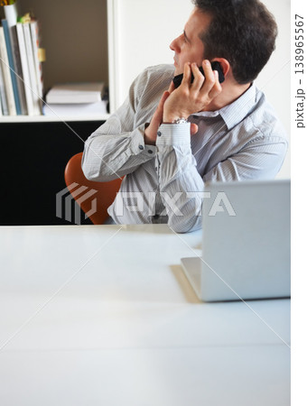 Phone call, office or businessman planning in company on mobile conversation as communication. Laptop, cellphone or manager in discussion at workplace talking or speaking of ideas looking at clock 138965567