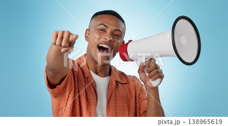 Man, megaphone and winner or pointing you for announcement, broadcast and choice or news on blue background. Portrait of person for join us, attention and voice with sale, bonus or winning in studio Man, megaphone and winner or pointing you for announcement, broadcast and choice or news on blue background. Portrait of person for join us, attention and voice with sale, bonus or winning in studio 138965619