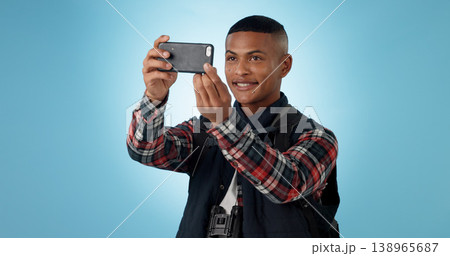 Hiking, man and cellphone with social media, photography and profile picture on a studio background. Person, traveller and model with a smartphone, travel and post with blog, tourism and adventure 138965687