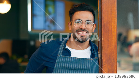 Portrait, entrance and happy man, restaurant business owner or coffee shop manager smile for cafeteria service. Hospitality, management and confident barista, waiter or server leaning on cafe door 138965696